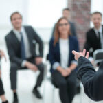 Businessman is making speech at conference room